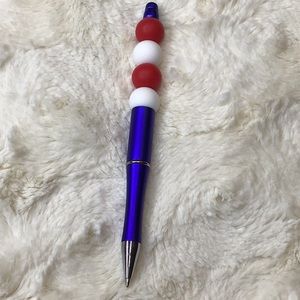 Handcrafted beaded pen. Red, white and blue. Made with bpa free silicone beads.